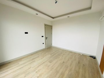 Versatile Apartments In Kusadasi For Sale With A Shared Pool - First bedroom