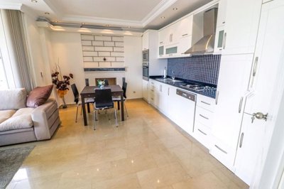 Furnished Investment Property For Sale In Alanya – Dining area and large kitchen