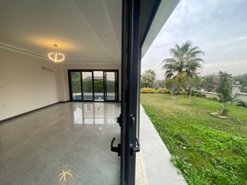 Cutting Edge Detached Kusadasi Villa For Sale - Lounge with exterior access