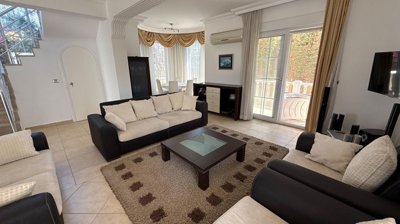 Attractive Detached Villa For Sale in Belek - Lounge with exterior access