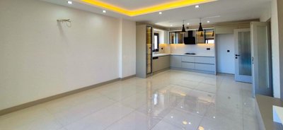 Newly Built Apartments In Kusadasi With A Shared Pool For Sale - Open-plan living space