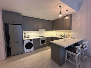 Key-Ready Ground-Floor Apartment In Belek For Sale - Modern kitchen with built-in appliances