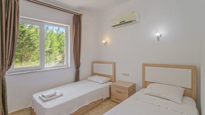 Stone Bungalow For Sale In Dalaman With A Private Pool & Garden - Light and airy twin room