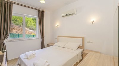 Stone Bungalow For Sale In Dalaman With A Private Pool & Garden - Double bedroom with garden views