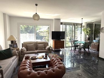 Charming Three-Bedroom Bodrum Property For sale - Spacious open-plan living area