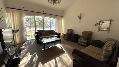 Riverfront Villa For Sale in Belek, Antalya With A Private Pool - Lounge with exterior access