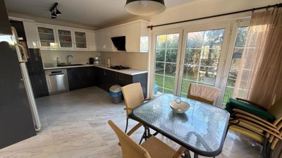 Riverfront Villa For Sale in Belek, Antalya With A Private Pool - Dining area to the kitchen