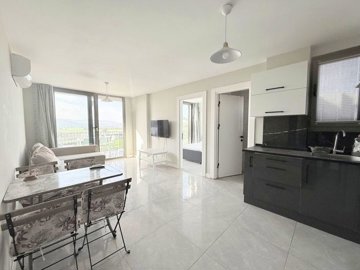 Blissful Apartment For Sale In Dörttepe, Milas - Dining space to the lounge