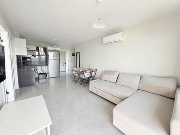 Blissful Apartment For Sale In Dörttepe, Milas - Open-plan living space