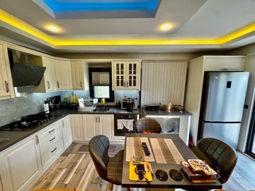 Sensational Fethiye Property For Sale - Equipped kitchen and dining space