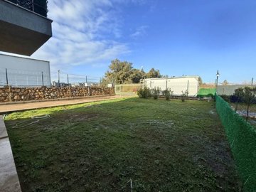 Modern Garden Apartment For Sale In Milas, Mugla - Large garden from the lounge patio doors