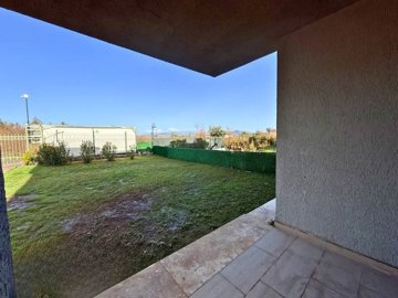 Modern Garden Apartment For Sale In Milas, Mugla - Covered terrace from the kitchen