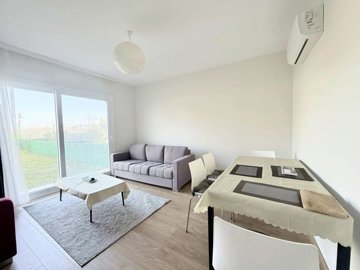 Modern Garden Apartment For Sale In Milas, Mugla - Lounge and dining area