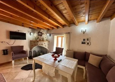 Rural Stone Bungalow For Sale In Fethiye - Living area with beamed ceilings