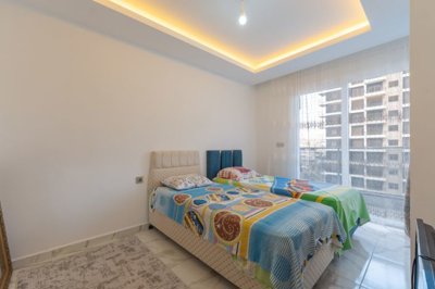 Alanya Key-Ready Apartment For Sale In Mahmutlar – Second bedroom, a twin room