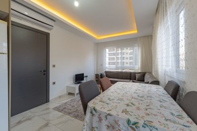 Alanya Key-Ready Apartment For Sale In Mahmutlar – From the kitchen to the lounge