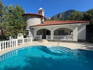 A Beautiful Stone Bungalow In Dalaman For Sale With A Private Pool - Main view of the bungalow and pool