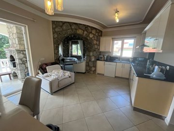 A Beautiful Stone Bungalow In Dalaman For Sale With A Private Pool - Traditional open-plan living area