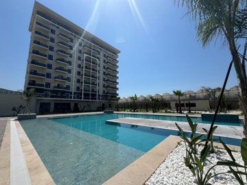 Brand-New Alanya Apartment For Sale - Social areas around the pool