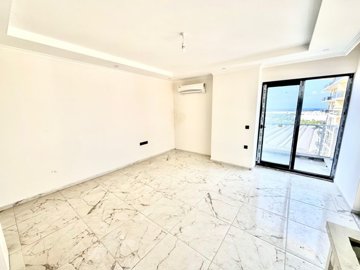 Brand-New Alanya Apartment For Sale - Lounge area to the balcony