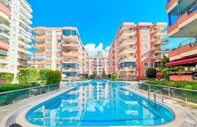 Key-Ready Seafront Apartment in Mahmutlar, Alanya For Sale - Communal pool and sunny terraces