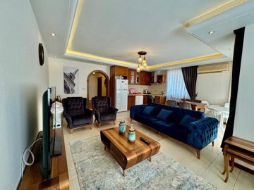 Key-Ready Seafront Apartment in Mahmutlar, Alanya For Sale - Spacious open-plan living room