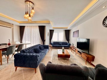 Key-Ready Seafront Apartment in Mahmutlar, Alanya For Sale - Beautifully furnished lounge