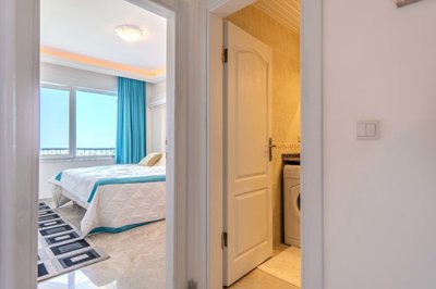 Blissful 2-Bedroom Apartment For Sale In Alanya, Mahmutlar – Hallway to the bedrooms and main bathroom