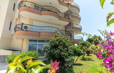 Blissful 2-Bedroom Apartment For Sale In Alanya, Mahmutlar – Pretty gardens