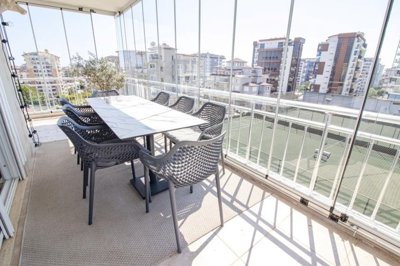 Sizeable Alanya Penthouse For Sale In Cikcilli - Enclosed balcony for alfresco dining