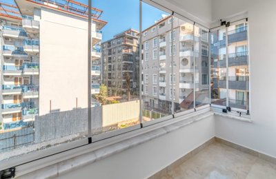 Renovated Alanya Beachfront Apartment For Sale - Enclosed bedroom balcony with sea views