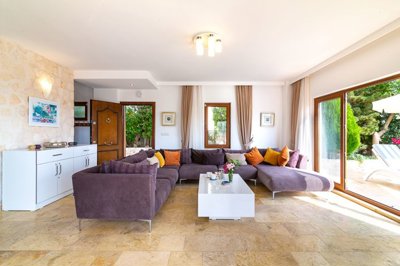 Stone Built Kalkan Villa For Sale – Furnished lounge with terrace and pool access