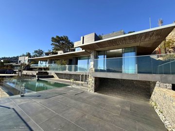Sensational Seafront Villa In Bodrum For Sale - Sun terraces around the private pool
