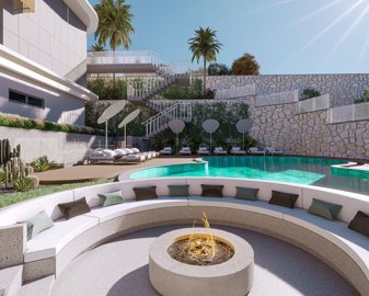 Desirable Kalkan Apartment For Sale - Social seating areas and communal pool