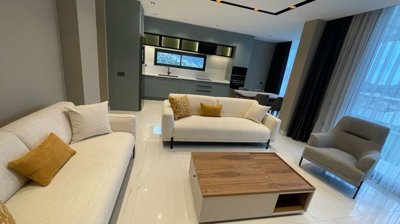 Desirable Kalkan Apartment For Sale - Lounge to the kitchen