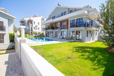 Deluxe Apartment For Sale In Ovacik, Fethiye – Lush lawns and sunbathing terraces