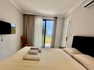 Sea View Kalkan Property For Sale - Direct garden access from this bedroom