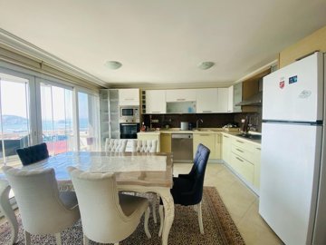 Sea-View Apartment For Sale In Kusadasi - Dining area and kitchen