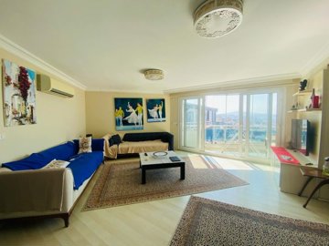 Sea-View Apartment For Sale In Kusadasi - Lounge with balcony access