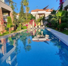 Apartment In Antalya For Sale Near The Beach In Kemer - Communal pool and social terraces