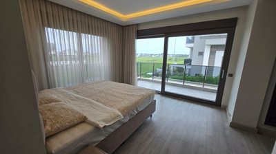 Luxury Villa With A Private Pool & Garden For Sale in Belek - Huge double bedroom with a balcony
