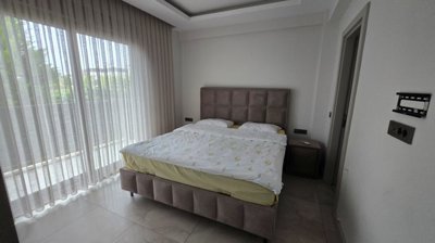 Luxury Villa With A Private Pool & Garden For Sale in Belek - Double bedroom with a balcony