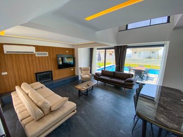 Sea View Luxury Property For Sale In Fethiye - Lounge with direct access to the pool and terrace