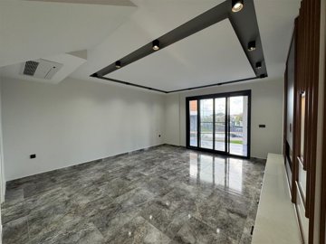 Detached Kusadasi Property For Sale With Nature Views - Lounge area with direct pool and terrace access