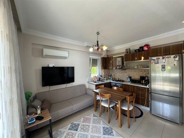 Delightful Apartment In Antalya For Sale - Living space with an American kitchen