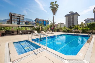 Seafront Apartment For Sale In Alanya - Enticing communal swimming pool