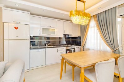 Seafront Apartment For Sale In Alanya - Kitchen and dining area