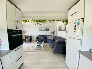 Penthouse Apartment For Sale In Didim – From the kitchen to the lounge