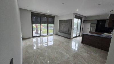 Tasteful Belek Apartment In Antalya For Sale - Spacious open-plan living area