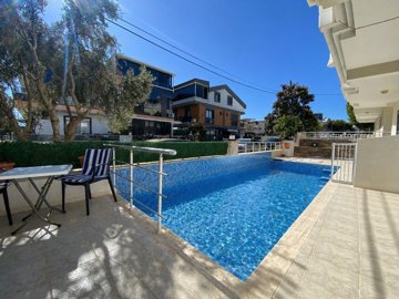 Sizeable Semi-Detached Villa For Sale In Didim – Pool, terrace and sunbathing area